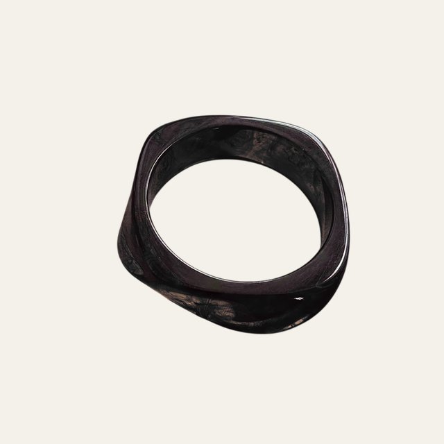 Pulsera Aria negra de forma orgánica